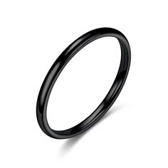 a black wedding ring on a white background