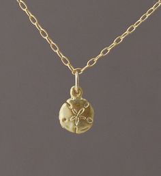 Tiny Gold Sand Dollar Necklace also in silver on Etsy, $22.00 Sand Dollar Necklace, Accessory Inspo, Gold Sand, Jewelry Accessories Ideas, Charm Necklaces, Jewelry Essentials