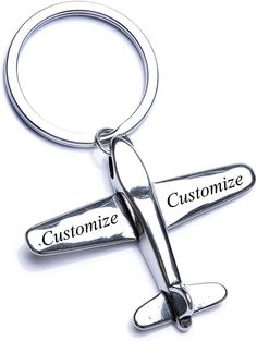 an airplane keychain with the words customize and cut out on it's side