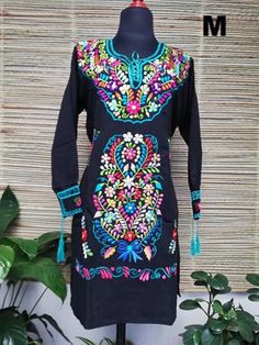 Beautiful Mexican dress embroidered in bright colors with silk thread, its sleeve is 3/4 with embroidered details on the cuffs. The embroidery for each dress is unique so the colors may vary. Mexican textile art has centuries of history and creativity throughout the country. Mexico is recognized as one of the leading countries with a beautiful artistic production in the textile world, miraculous hands of talented artisans from different states of the country create stunning embroidery clothing, Mexican Huipil, Blanket Dress, Embroidery Clothing, Mexican Embroidered Dress, Mexican Textiles, Mexican Dress, Vintage Cowboy Boots, Sassy Pants, Mexican Dresses