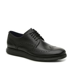 Cole Haan-Original Grand Wingtip Oxford Step up your handsome shoe collection with the Original Grand oxford from Cole Haan. This dress shoe features a wingtip round toe and perforated brogue detailing that will give your outfit a dapper finishing touch! Business Oxfords With Perforations And Round Toe, Casual Wingtip Oxfords For Business, Business Low-top Oxfords With Brogue Detailing, Business Casual Wingtip Oxfords With Branded Insole, Derby Wingtip Lace-up Shoes With Perforations, Wingtip Lace-up Shoes With Perforations For Derby, Casual Wingtip Dress Shoes With Goodyear Welt, Derby Lace-up Wingtip Shoes With Perforations, Classic Business Oxfords With Perforations