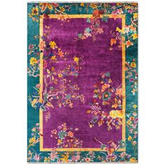 a purple rug with colorful flowers on it