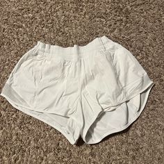 Size 10 White And Basically Brand New No Flaws And Still Perfect Condition White. Lululemon Shorts White Athletic Shorts With Built-in Shorts For Light Exercise, White Summer Activewear Shorts, Summer White Short Activewear, White Activewear Shorts For Light Exercise, Casual Lightweight White Shorts, White Go-dry Shorts For Beach, White Go-dry Bottoms For Light Exercise, White Lightweight Athleisure Shorts, Casual White Shorts For Light Exercise