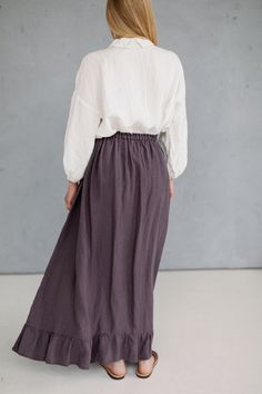 Linen maxi skirt with ruffles for women. Romantic, flowing and soft: made from soft linen it feels extremely smooth and pleasant on the skin. * Made of 100% natural washed and soft medium weight OEKO-TEX certified linen (160g). * Linen skirt with two inner pockets on the sides. * Ruffled bottom. * High-waisted, flared shape skirt. * Color in the picture: purple. Discover more of La Petite Alice organic linen clothes and accessories here: https://www.etsy.com/shop/Lapetitealice **The shipping cos Flowy Full Skirt With Embroidery, Flowy Full Skirt With Floral Embroidery, Peasant Style Relaxed Fit Lined Skirt, Peasant Style Long Flowy Skirt, Peasant Style Long Ruffled Skirt, Bohemian Long Skirt With Floral Embroidery, Long Skirt With Floral Embroidery, Peasant Long Lined Skirt, Flowy Full Embroidered Skirt