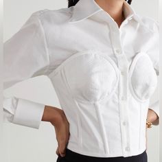 Gorgeous Corset Detailed Button Down Dress Shirt To Elevate Any Corporate Business Look! When A Plain White Shirt Is Just To Boring, Opt For This Elevated Classic! Corsetry Detailing With Real Boning, And Shaped/Lined Cups Create The Perfect Classic For Your Wardrobe. $1,795 Msrp. Only Flaw Is Small Mart At Interior, Which Does Not Show On The Outside. It Way Come Out With A Cleaning. This Garment Was In A Store And Tried On, Which Is Likely How It Got The Mark. There Are Multiple Layers Of Fabr Luxury White Tops With Buttons, Fitted Elegant Tops With Button Closure, Luxury White Buttoned Top, Luxury White Top With Buttons, Elegant Fitted Button-up Tops, Luxury Fitted Cotton Tops, Designer Fitted Top For Daywear, Luxury Fitted Cotton Top, Designer Fitted Summer Blouse