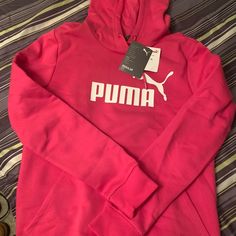 Womens Puma Hoodie Casual Puma Logo Sweatshirt For Winter, Sporty Puma Logo Sweatshirt For Winter, Casual Winter Hoodie With Puma Logo, Casual Puma Hoodie For Streetwear, Casual Puma Logo Hoodie For Streetwear, Pink Hooded Sweatshirt For Sports, Pink Hooded Sweatshirt For Sports Season, Casual Long Sleeve Hoodie With Puma Logo, Winter Sporty Puma Logo Sweatshirt