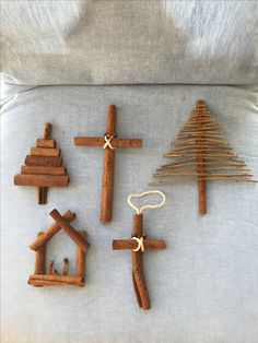 the wooden crosses have been made to look like they are being used for christmas decorations