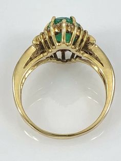 "Genuine Natural Colombian Emerald 14kt Gold Diamond Ring, Size 7 This beautiful ring features a vibrant, natural, and earth-mined Colombian emerald measuring 8.6x6.5mm (1.59ct), it has intense green color with slight blue undertones. The oval emerald is set in a safe 6 prong setting. This ring is accentuated by 22 genuine, full-cut diamonds (G, VS2, 0.44ctw) grain set in a solid 14k yellow gold ring setting. This ring is size 7 and weighs 5.1 grams. The emerald has some inclusions which are com Green Metal, Colombian Emeralds, Gold Ring Sets, Gold Diamond Ring, Ring Setting, Beautiful Ring, Gold Diamond Rings, Emerald Ring, Ring Size 7