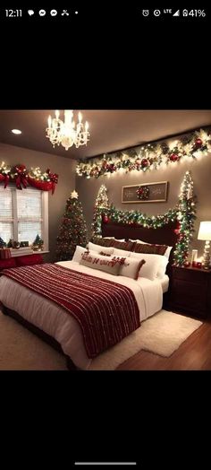 a bedroom decorated for christmas with lights and decorations