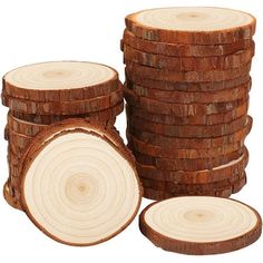 several pieces of wood stacked on top of each other in front of a white background