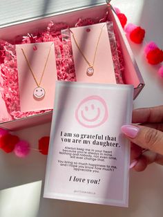 This set of necklaces makes for a perfect gift for your daughter- it's sure to bring a smile to your face and your daughter's too!. It includes two "Happy face" necklaces and comes with a lovely note, as shown in the picture. The necklaces are already packaged in a beautiful pink 5x7 inch box, ready to be gifted. At checkout, you can select the "this is a gift" option if you prefer not to display the invoice. PRODUCT DETAIL Necklace length: 15.5"with 16.5" and 17.5"Extender Gold dipped Hypoaller Mother's Day Birthday Gift Wrapped Necklace, Gift-wrapped Necklace For Birthday On Mother's Day, Personalized Gift Necklace For Mother's Day In Gift Box, Pink Inspirational Jewelry For Valentine's Day, Personalized Pink Charm Necklace As Gift, Personalized Gift Necklace For Mother's Day With Gift Box, Personalized Necklace For Mother's Day With Gift Box, Mother's Day Jewelry Gift With Message Card, Inspirational Necklace For Mother's Day Gift