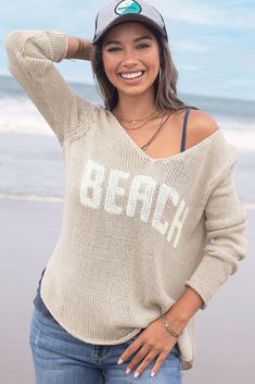 This top selling relaxed-fit v is the perfect beach sweater. There is a reason that it is in everyone's cart! Light, soft, ropey cotton V with knit-in lettering. Flattering, curved shirt-tail hems with side slits that create a soft drape. Airy, loose construction keeps you comfortable even in warmer weather. Light enough to tuck, or half tuck to create that easy effortless look. Throw it over your bathing suit for a day at the beach. Composition: 60% cotton, 40% acrylic SIZE CHART See our Measur Curved Shirt, Beach Sweater, Boyfriend Cardigan, Wooden Ship, Sweater Fits, Beach Lovers, Personal Marketing, Autumn Day, Top Selling