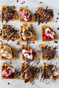 several waffles with different toppings on them