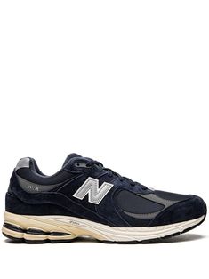 navy blue calf suede/mesh panelling logo patch to the side round toe front lace-up fastening contrasting heel counter branded insole rubber sole These styles are supplied by a premium sneaker marketplace. Stocking only the most sought-after footwear, they source and curate some of the most hard to find sneakers from around the world. New Balance Navy Blue, Shoes List, New Balance 2002r, Sneakers Blue, New Balance Shoes, New Balance Sneaker, Blue Hues, Patch Logo, New Balance