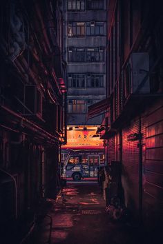 an alley way with a bus parked in it