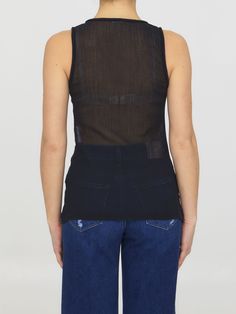 Black cotton blend tank top with semi-sheer design. The model is 180cm tall and wears size 34.  Size nationality: DE  Product number: 38473408  Product code: J02NL0106J45144001  Composition: 52% cotton, 48% polyester Sheer Nylon Fitted Tank Top, Luxury Fitted Sheer Tank Top, Black Sleeveless Tank Top With Smoothing Details, Sheer Sleeveless Nylon Tank Top, Black Sheer Non-stretch Top, Sheer Tank Top, Platform Wedge Heels, Premium Brands, Dress Pant