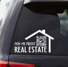 a sticker on the back of a car that says ask me about real estate