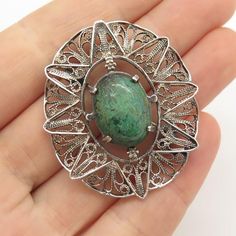 925 Sterling Silver Vintage Turquoise Gem Filigree Pin Brooch / PendantWeight: 9.5gWELCOME TO PAWN SHOPWe are an actual pawn shop and have been in business for over 25 years.Since 1990, our establishment has been serving a variety of clients by providing them with short term cash solutions and options of liquidity regarding their treasured heirlooms.Acknowledging that today′s customers are very sophisticated and are looking for a variety of investments, our acquisitions are hand-picked for our s Green Sterling Silver Brooches As Gifts, Green Filigree Brooches As A Gift, Green Filigree Brooches As Gift, Oval Green Brooch Jewelry, Green Sterling Silver Brooch For Gift, Green Sterling Silver Brooches For Gifts, Green Sterling Silver Brooch Jewelry, Green Filigree Brooches For Gifts, Silver Oval Filigree Brooches