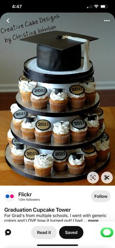 cupcakes are stacked on top of each other in front of a graduation cap