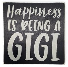 a black and white sign that says happiness is being a gigi on the front