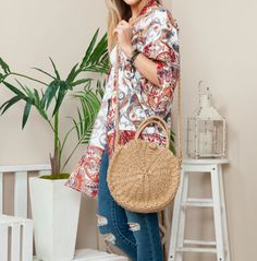 Elevate Your Summer Style with the Morgan Rattan Round Bag! 🌞✨ Fit: This versatile bag features a spacious interior with a secure button closure, perfect for carrying your essentials in style. Features: Crafted from durable, eco-friendly materials, it comes with both top handles and a crossbody strap for multiple carrying options. Why We Love It: Its classic design and neutral colors make it the ideal accessory for any summer outfit, seamlessly blending fashion and function. Colors: Tan & Ivory Casual Travel Satchel For Spring, Casual Spring Travel Satchel, Versatile Summer Satchel For Vacation, Versatile Straw Satchel For Travel, Versatile Straw Satchel Bag For Travel, Versatile Satchel Straw Bag For Travel, Spring Travel Satchel With Adjustable Strap, Versatile Satchel With Adjustable Strap For Vacation, Versatile Summer Travel Satchel