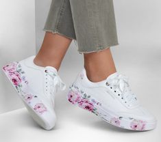 Step out in signature comfort with the stylish Skechers Cordova Classic - Painted Florals. This lace-up casual sneaker design features a synthetic duraleather upper with a floral print midsole and a cushioned Skechers Air-Cooled Memory Foam insole. | Skechers Women's Cordova Classic - Painted Florals Sneaker | Medium Width | Skechers Air-Cooled Memory Foam comfort insole | Synthetic duraleather upper with a lace-up front | Shock-absorbing midsole | Flexible traction outsole | 1 1/4-inch heel hei Sketchers Shoes For Women, Shoes Painting, Skechers Shoes Women, Jen Stark, Cinderella Moments, Painted Florals, Shoe Decorations, Painted Sneakers, Sneaker Design