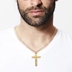 Experience the ideal fusion of tradition and modern elegance with our Italian Gold Cross Necklace for Men. Masterfully crafted in Italy, this stunning cross pendant is available in your choice of luxurious 18k or 14k gold, embodying both faith and sophistication. The pendant showcases a unique twisted design, featuring a rough sandblasted surface with polished edges, creating a striking contrast that enhances its refined elegance. Measuring 26 millimeters in width and 43 millimeters in height, t Cross Necklace For Men, Neutral Jewelry, Jeweled Earrings, Gold Cross Necklace, Gold Cross Pendant, Italian Jewelry, Necklace For Men, Ring Pendant Necklace, Gold Cross