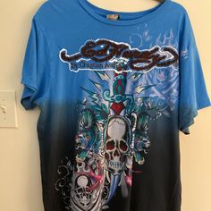 Official Ed Hardy -2xl Mens T-Shirt -Excellent Condition -Designer Tag Still Attached *Make Me An Offer* Blue Short Sleeve Tops With Skull Print, Blue Skull Print Crew Neck Top, Casual Blue Tops With Skull Print, Casual Blue T-shirt With Skull Print, Ed Hardy Men, Ed Hardy Outfit, Ed Hardy Shirt, Hardy Shirts, Ed Hardy Tattoos