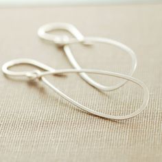 Sterling Silver Teardrop Earrings Metal Hoop Earrings by aubepine, $19.50 Minimalist Nickel-free Teardrop Earrings For Everyday, Handmade Minimalist Teardrop Earrings, Everyday Nickel-free Minimalist Teardrop Earrings, Silver Small Hoop Teardrop Earrings With Ear Wire, Modern Teardrop Hoop Earrings As Gift, Minimalist Teardrop Hoop Earrings With Ear Wire, Minimalist Teardrop Jewelry With Lever Back Ear Wires, Minimalist Teardrop Dangle Earrings With Ear Wire, Minimalist Small Hoop Teardrop Earrings For Gift