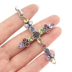 Great vintage condition.  925 Sterling Silver Vintage Amethyst Garnet Citrine Peridot Iolite Cross Pendant  Weight: 13.0g   WELCOME TO PAWN SHOP We are an actual pawn shop and have been in business for over 25 years. Since 1990, our establishment has been serving a variety of clients by providing them with short term cash solutions and options of liquidity regarding their treasured heirlooms. Acknowledging that today′s customers are very sophisticated and are looking for a variety of investments Multicolor Multi-stone Sterling Silver Gemstones, Multicolor Multi-stone Gemstones In Sterling Silver, Multicolor Multi-stone Amethyst Jewelry, Spiritual Silver Multi-stone Gemstones, Pawn Shop, 25 Years, Cross Pendant, Citrine, Garnet