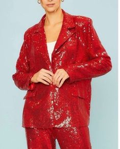 Notched Collar oversized blazer jacket with unusable side pockets. Polyester spandex material model is wearing a small Black blazer is only available Red color is only to show detail Red Notch Lapel Outerwear For Party, Notch Lapel Blazer For Fall Parties, Fall Workwear Blazer With Sequins, Red Fall Party Blazer, Long Sleeve Sequined Blazer For Work, Sequined Workwear Blazer, Red Blazer For Night Out In Winter, Fall Notch Lapel Blazer With Sequins, Red Sequin Jacket