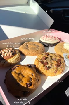 a box filled with lots of different types of cookies