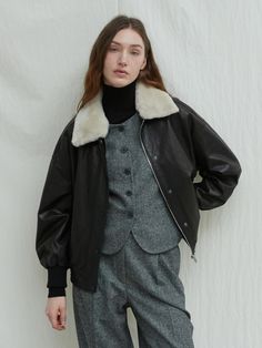 Composition : Shell: 100% natural leather, 100% lining: 100% polyester, Contrast: 100% natural fur , filling: 100% polyesterColor : BlackCountry of Origin : Republic of Korea Chic Shearling Leather Jacket For Work, Shearling Leather Jacket With Faux Fur Trim For Work, Chic Leather Jacket With Faux Fur Trim, Sheepskin Leather Jacket With Faux Fur Lining For Work, Chic Shearling Leather Jacket With Faux Fur Trim, Classic Fur Coat With Padded Collar For Fall, Classic Leather Fur Coat With Faux Fur Trim, Classic Leather Coat With Faux Fur Trim, Elegant Leather Jacket With Padded Collar For Winter