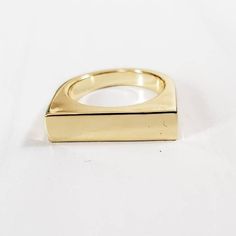 This ring is everything! The 90s are back and so is this gold plated brass flat top ring.  It's a trendy and fun 18k gold plated brass ring blank perfect for jewelry making either by engraving or stamping.  About the item: * The ring blank is shiny and heavy. * The flat top measures 5mm x 20mm and can fit a decent amount of text. Everyday Gold Brass Midi Rings, Modern Gold Brass Signet Ring, Gold Brass Signet Ring For Everyday, Everyday Gold Stackable Brass Rings, Gold Rectangular Metal Rings, Gold Open Ring For Everyday Wear, Gold Open Ring For Everyday, Minimalist Gold Signet Ring In Brass, Minimalist Gold Brass Signet Ring