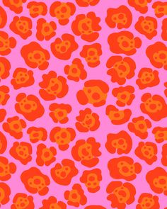 an orange and pink pattern with skulls on it