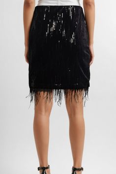 This skirt could make a random Tuesday night feel just like NYE. A sparkly, statement-making mini for your next party, the fully lined Essex Skirt is covered in sequins, with an encased-elastic waistband and faux feather trim along the hem. Feather Trim, Black Beauty, Skirt Black, Trim, Elastic, Skirt, Beauty, Black