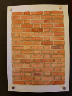 a piece of paper that has been cut out to look like a brick wall