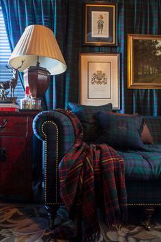 a living room filled with furniture and pictures