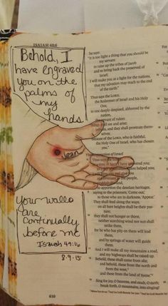 an open bible with writing on it and a hand reaching out to another person's hand