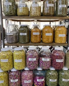 many jars filled with different types of food