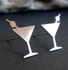 Tiny little martini glass stud earrings handmade in the metal of your choice. These make a great gift for cocktail lovers. The Details ∞ Artisan handmade jewelry ∞ Tiny martini glasses (approx 11.2mm x 7.3mm) ∞ Choose from sterling silver, 14k gold-filled or solid 14k yellow gold ∞ Earring backs included in the metal of your choice ∞ Made to order ∞ Gift box included ∞ Made in the USA IMPORTANT NOTE FOR 14K GOLD FILLED EARRINGS If you are purchasing our gold filled stud earrings please keep in m Gold Martini, Margarita Earrings, Martini Earrings, Unique Martini Glasses, Funky Martini Glasses, Artisan Jewelry Handmade, Dirty Martini, Gold Filled Earrings, Yellow Gold Earring