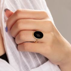 "\"Vintage Black Onyx Ring - Exquisite Black Onyx Ring\" Elevate your style with this extraordinary Black Onyx ring, designed to captivate and leave a lasting impression. Crafted with precision, this statement piece showcases a genuine Black Onyx gemstone, renowned for its deep, mysterious allure. Key Features: - Genuine Black Onyx: This ring features a stunning, high-quality Black Onyx stone that exudes elegance and sophistication. - Unique Design: Our expert artisans have meticulously crafted Classic Black Enamel Ring, Classic Black Crystal Ring, Modern Black Cabochon Rings, Vintage Onyx Black Rings, Black Gemstone Open Ring, Black Oval Enamel Ring For Anniversary, Black Open Ring With Gemstone, Black Vintage Enamel Ring, Vintage Black Round Rings