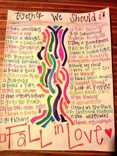 a piece of paper with words written in different colors on it and the word fall in love