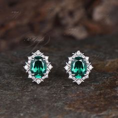 Product Detail Material: 925 Sterling Silver, 10k/14k/18k Solid Rose/White/Yellow Gold, Platinum Quantity: 2pcs (a pair) earrings Center Stone: 6x8mm Oval Cut Lab Emerald Side Stones: Round Cut Moissanites Custom Service 1, Gemstones can be replaced with others. 2, All metal can be customized. 3, The earrings can be customized according to the design you want. Please contact us if you need any personalized custom earrings. We will try our best to meet your needs. Only you can't think of it, we can't do it without us. Shipping It's made-to-order jewelry, it will take 2-4 weeks to make it. Once the pendant/necklace is finished, it will be sent by USPS, FedEx or DHL. Return & Refund There is a 30-day return guarantee. But as it's handmade pendant/necklace, handcrafted fee and shipping fee nee Oval Cubic Zirconia Earrings Hallmarked, Oval Birthstone Earrings In White Gold, Oval Halo Setting Earrings For Anniversary, Oval White Gold Earrings With Birthstone, Oval Birthstone Earrings For Formal Occasions, Wedding Earrings With Halo Setting For May Birthstone, Oval Green Cubic Zirconia Earrings, Green Oval Cubic Zirconia Earrings, Green Cubic Zirconia Oval Earrings