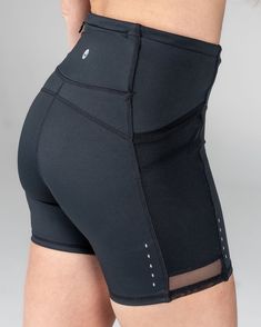 Explore the Mesh Speed Shorts, designed for dynamic movement and tailored flexibility with a hidden adjustable waistband and a 5-inch inseam. Ideal for high-impact activities, these shorts feature a non-slip double top seam ensuring a secure, roll-free fit. The integrated breathable mesh panels align seamlessly with the shorts' fabric, providing cooling comfort during intense workouts. Equipped with two side pockets and a zippered back pocket, they're perfect for stashing essentials. These short Functional Moisture-wicking Bottoms With 5-inch Inseam, Athletic Fit Black Bottoms With Built-in Shorts, Sports Bottoms With Contoured Waistband And 5-inch Inseam, Sporty Stretch Athletic Shorts With 5-inch Inseam, Athletic Fit Bottoms With Built-in Shorts, Functional Black Bottoms With Built-in Shorts, Sports Shorts With Contoured Waistband And 5-inch Inseam, Sporty Yoga Bottoms With Built-in Padding, Training Activewear With Built-in Shorts