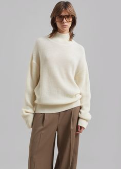 Color: Ecru Midweight wool blend fabric Relaxed fit Turtleneck Drop shoulders Rib knit Slip on style 50% Wool 50% Acrylic Dry Clean By Amomento. Imported Turtleneck Pullover, Fitted Turtleneck, Drop Shoulder, Rib Knit, Wool Blend, Turtle Neck, Dry Clean, Slip On, Relaxed Fit