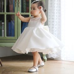 Flower Girl Dresses Super Cute White Princess Flower Girl Dress Baby Toddler Pageant Gown Princess Style Pageant Dress With Satin Bow, Sleeveless First Communion Dress With Ruffles For Pageant, Sleeveless Ruffled First Communion Dress For Pageants, Sleeveless Ruffled First Communion Dress For Pageant, White Sleeveless Pageant Dress For Spring, Sleeveless Princess Dress For First Communion, White Dresses With Satin Bow For Spring, White Satin Bow Dress For Spring, White Spring Dresses With Satin Bow