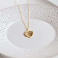 This dainty necklace will add a special touch to everyday outfits. 18" 16k gold plated brass necklace. Dainty Hypoallergenic Gold Necklace, Dainty Gold Hypoallergenic Necklace, Delicate Hypoallergenic 14k Gold-filled Necklace, Everyday Gold Charm Necklaces 16 Inch, Gold Hypoallergenic Necklace For Her, Everyday Gold Charm Necklace 16 Inch, Minimalist Hypoallergenic Gold Necklaces, Hypoallergenic Gold Plated Necklace For Gift, Minimalist 16 Inch Gold Charm Necklace