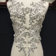 "IF you are a DIY lover or you are just finding a bling bling applique for your beautiful bridal dress, then this crystal applique is really perfect for you. We highly recommend you this shiny crystal diamante rhinestone applique ! Size: Width: 6.2\" (16 cm) length: 11.8\" (30 cm) Usage Method: By sew on or iron on Good Materials and Refined Handicrafts Guarantee the Good Quality - The stones are very bright and sparkly. Even more stunning and prettier in person. - The claws encrust the rhinesto Wedding Dress Bodice, Bodice Applique, Bling Dress, Wedding Applique, Beautiful Bridal Dresses, Wedding Dress Sash, Sparkle Wedding Dress, Sparkle Wedding, Dress Sash