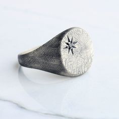 Engraved silver north star men ring. This ring is inspired by the astrology. You can buy this ring, which will attract all the attention thanks to its flawless handwork details, either 925 sterling silver or silver plated on brass.both materials are produced with the same craftsmanship and have the same appearance.This unique ring, which those who see it will look at again and cannot take their eyes off, will be packaged appropriately for gifting. MATERIALS: - Solid 925 sterling silver -Brass ( Gothic Jewelry Diy, Silver Pinky Ring, Mens Bling, Cowl Top, Man Ring, Pole Star, Men Ring, Mens Silver Rings, Mens Ring